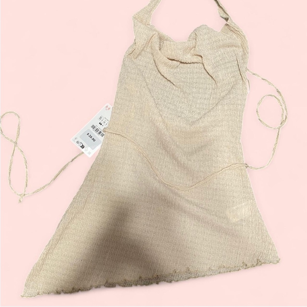 TEXTURED ASYMMETRIC TOP CREAM